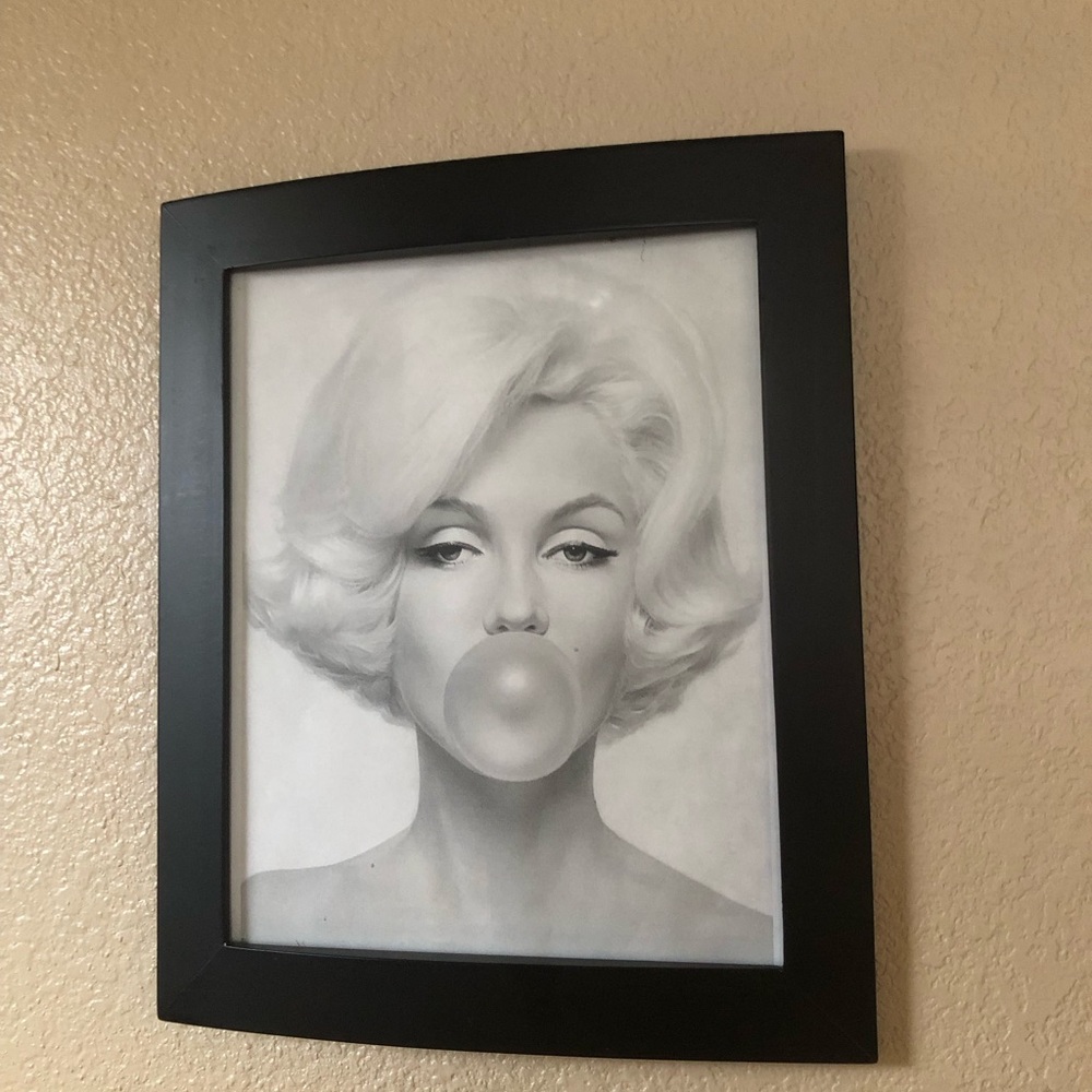 Black Framed Wall Art with Iconic Portrait